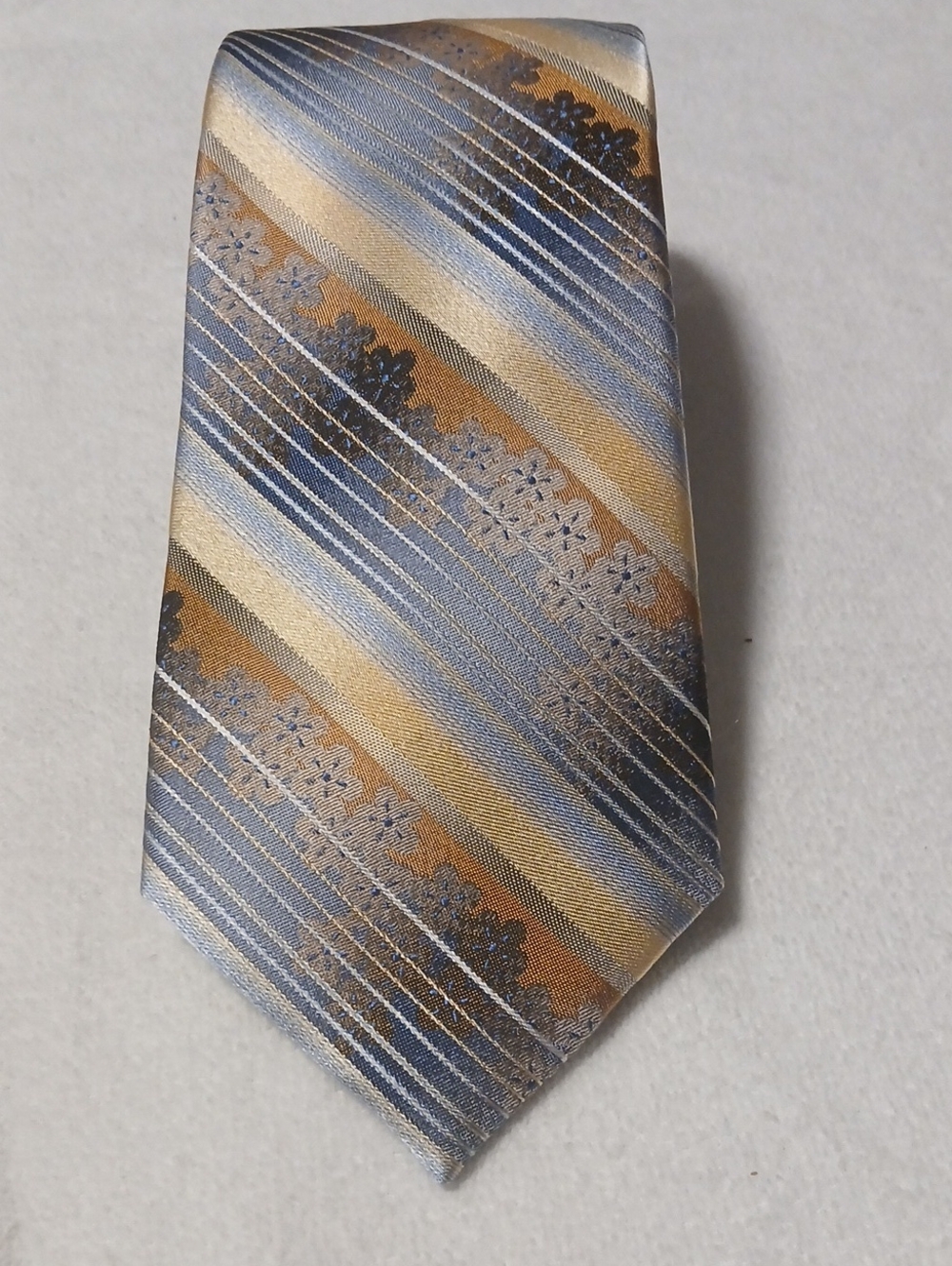 Van Heusen Blue, Gold and Cream Diagonal Floral Tie